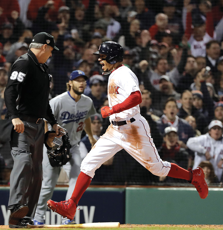 Mookie Betts scores on an RBI single by Andrew Benintendi during the first - photo 7