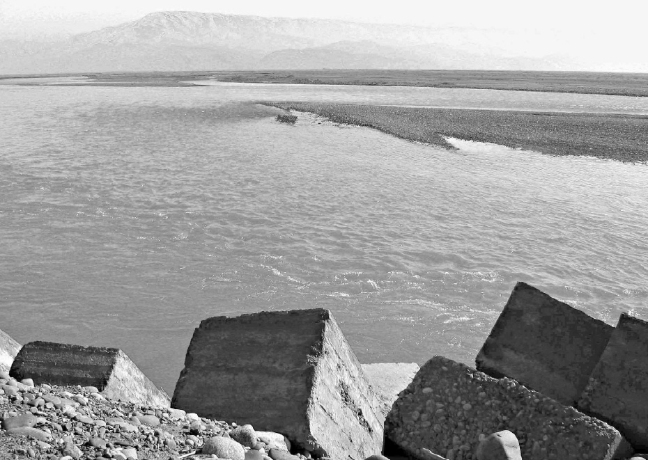 River engineering in Tajikistan with the mountains of Afghanistan beyond - photo 3