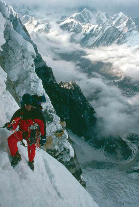 Taking a rest at 19500 feet Jeff Lowe surveys the deteriorating weather that - photo 16