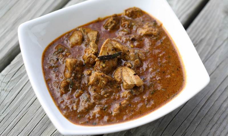 Chicken thighs cooked with mango pickle onion and tomato gravy Serves - photo 5