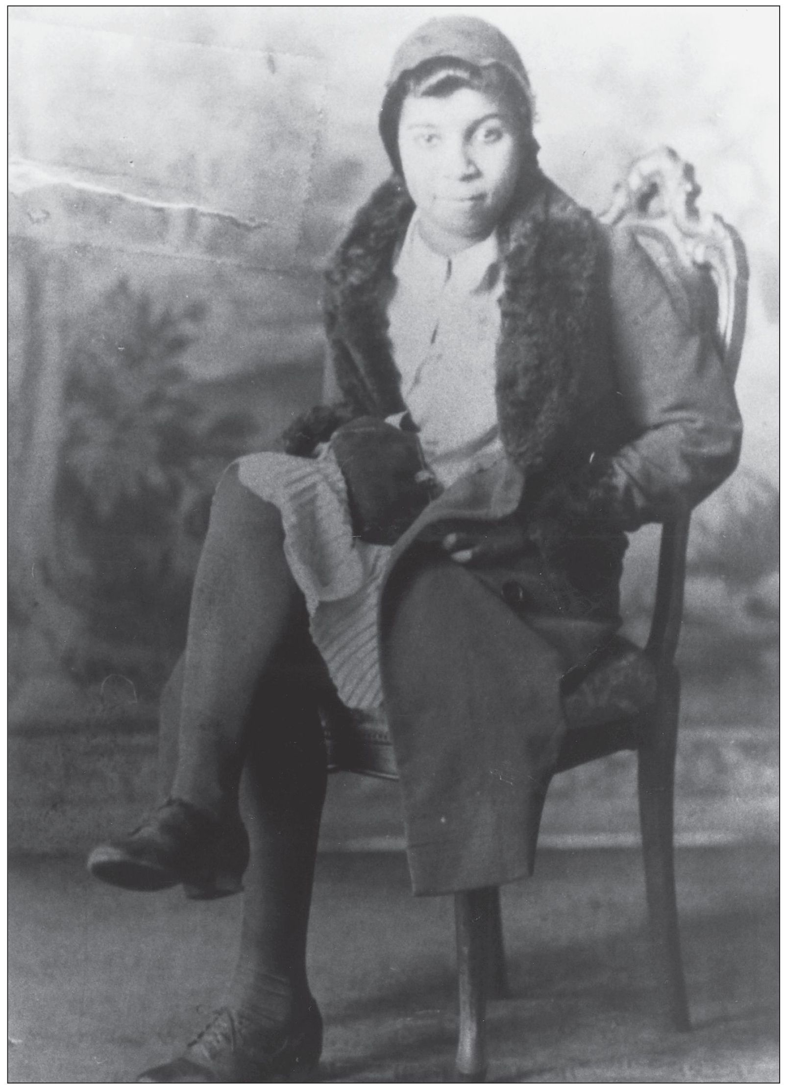 Elizabeth Selene Smith Younger is pictured here in a hat and fur-collared - photo 12