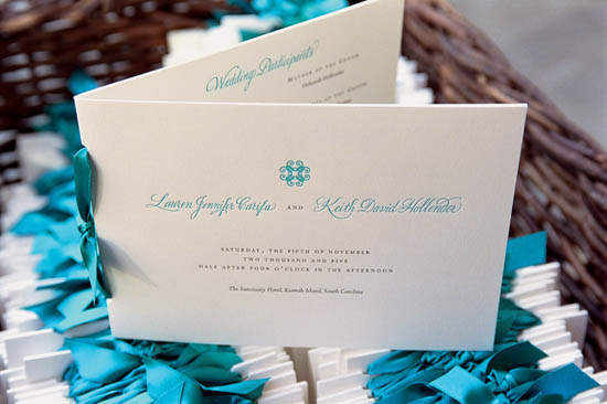 White letterpress programs were tied with a teal ribbon and emblazoned with the - photo 14