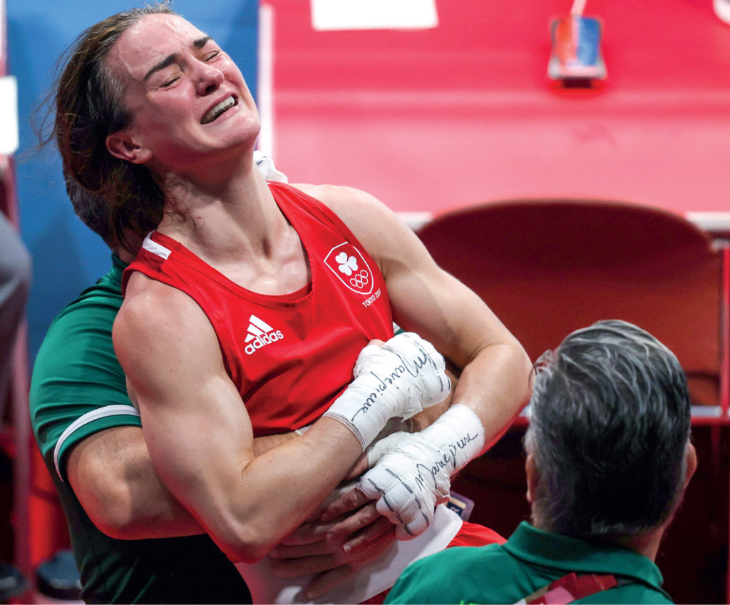 Celebrating Olympic gold with my coaches Zaur Antia and John Conlan - photo 19