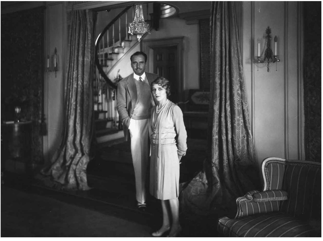 Doug and Mary in the front vestibule of Pickfair with its circular staircase in - photo 2