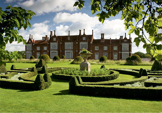 Helmingham Halls long south facade faces across the moat to the Parterre and - photo 6