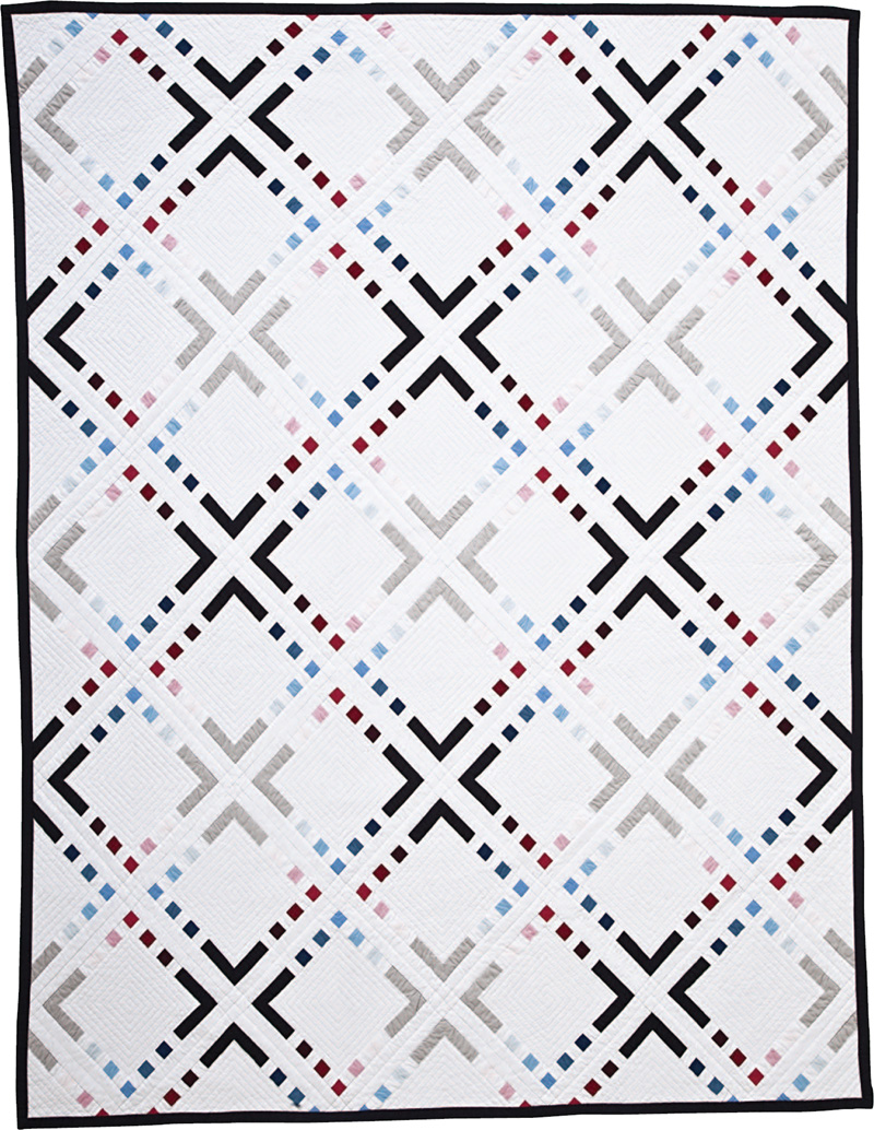 The use of solid fabrics on a white background renders this quilts geometric - photo 10