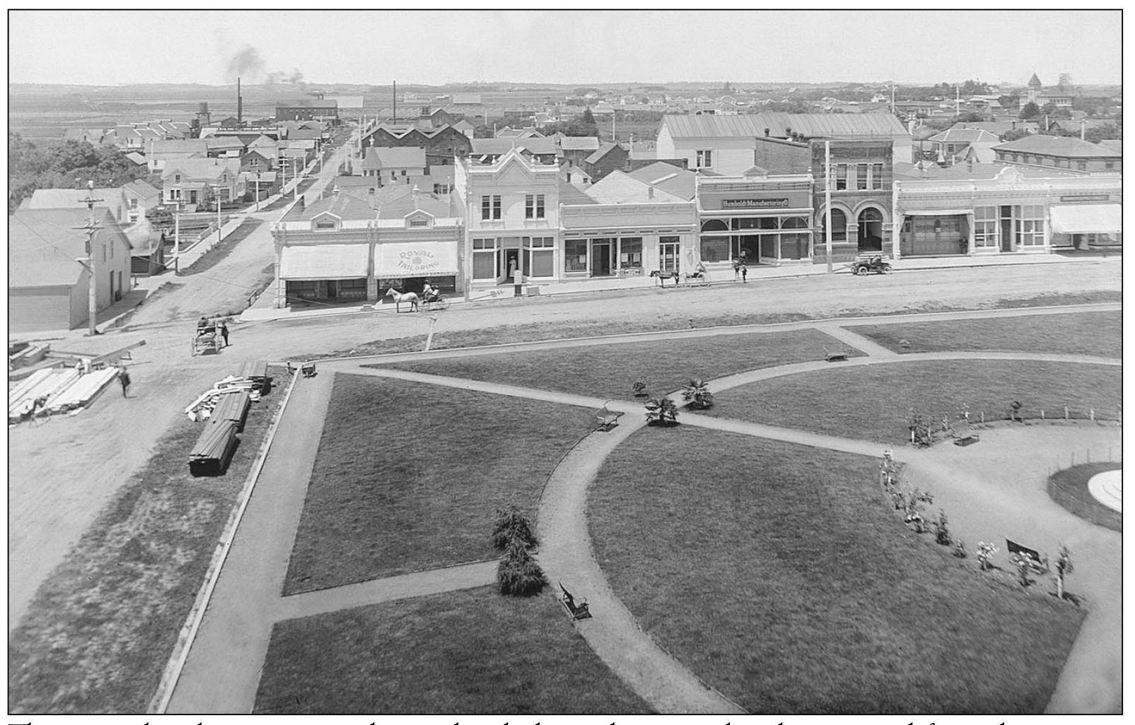 The west plaza businesses in this undated photo show a tailor shop second from - photo 7