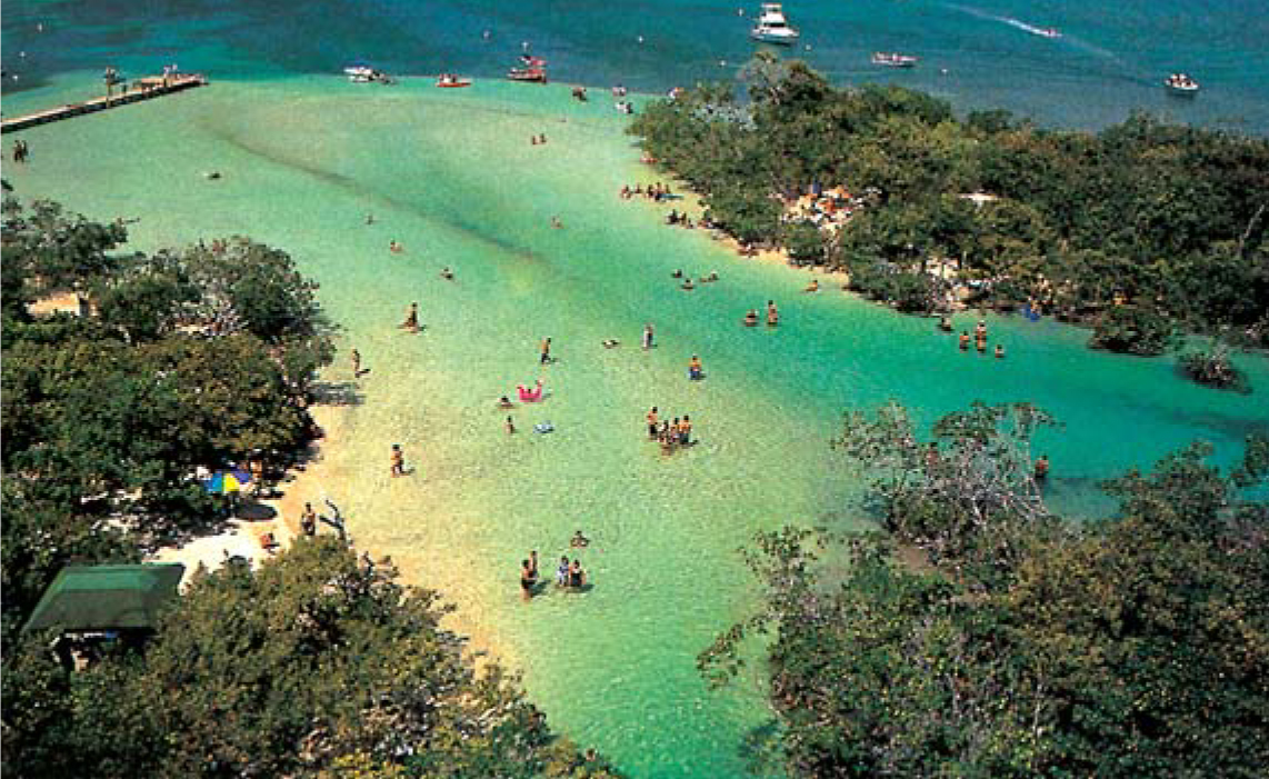 Swimmers enjoy the warm bay waters of Gunica on the southern coast of the - photo 12