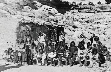 Paiute Indian group posed in front of adobe house circa 1909-1932 Though his - photo 9