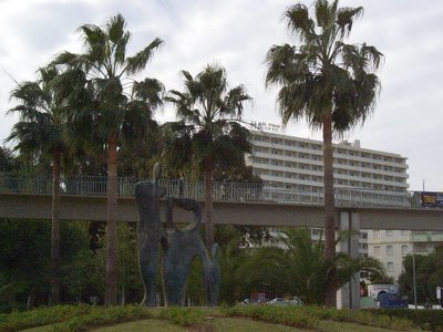 Malaga-Torremolinos Spain - sculpture of family group withHotel El Pinar in - photo 2