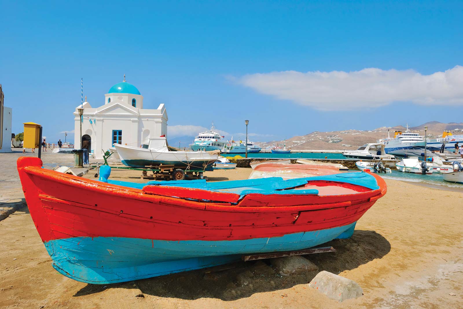 a boat on a Mykonos beach Its increasingly easy to travel across the Aegean and - photo 11