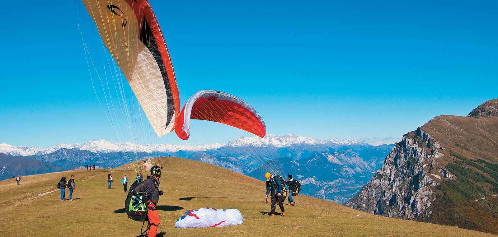 Taking a panoramic cable car ride to the top of then paragliding off the - photo 12