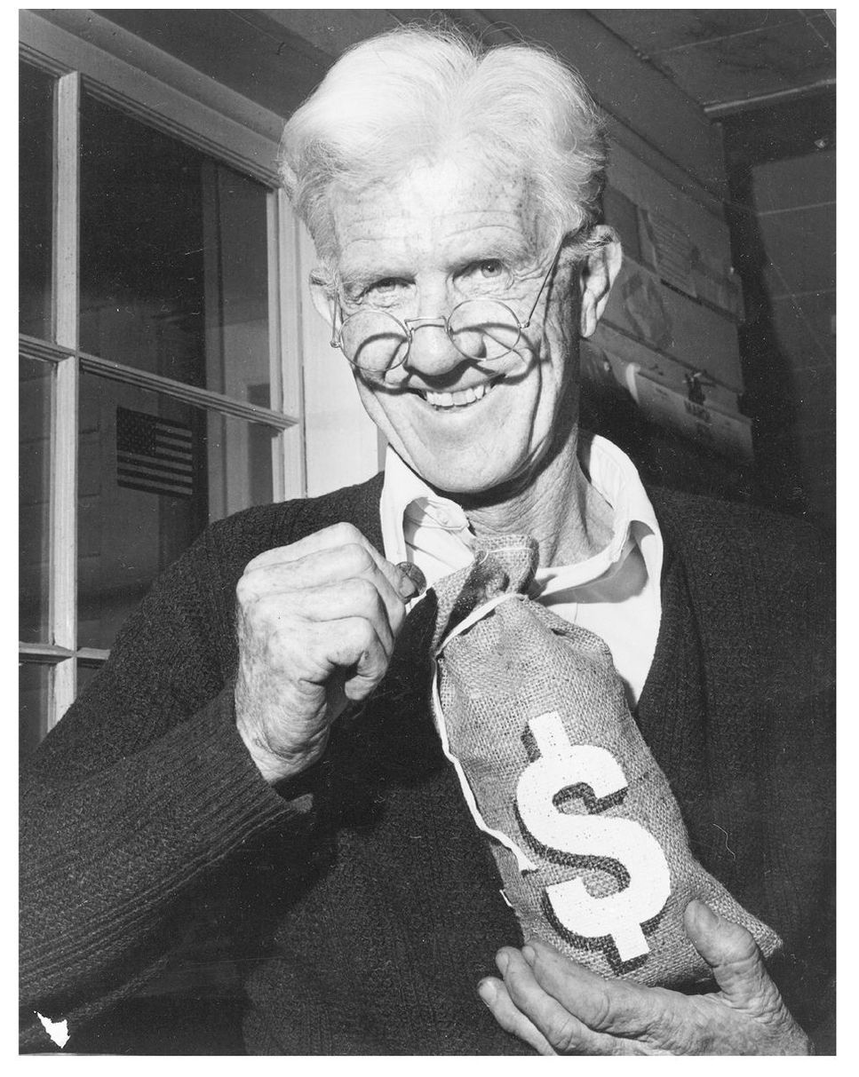 Charles Garvin stands with the reward of his labors a sack of dimes Of - photo 5