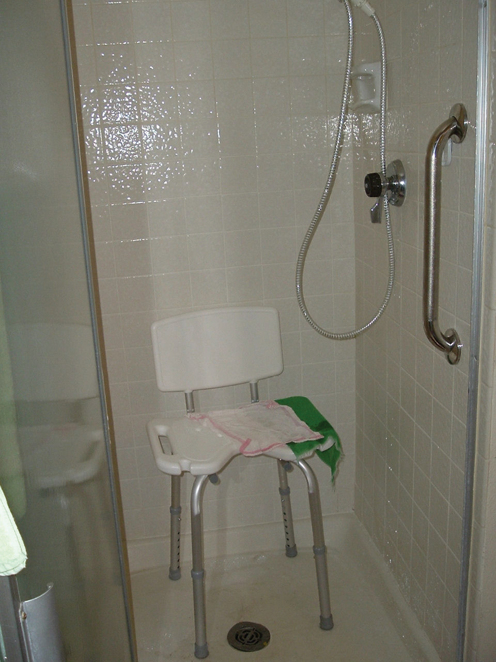 This can be another useful position for a shower chair and grab bar when - photo 13