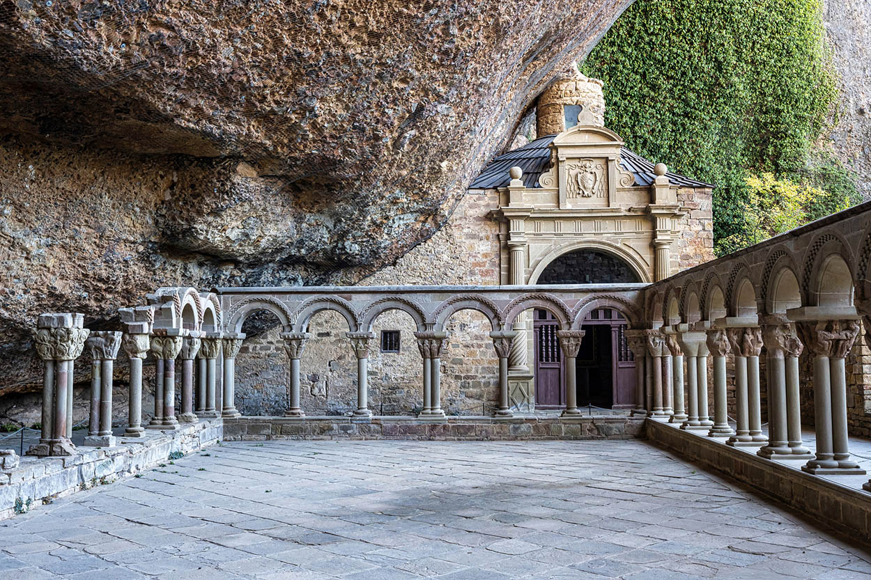 San Juan de la Pea monastery Built under a dramatic rock overhang in a remote - photo 13