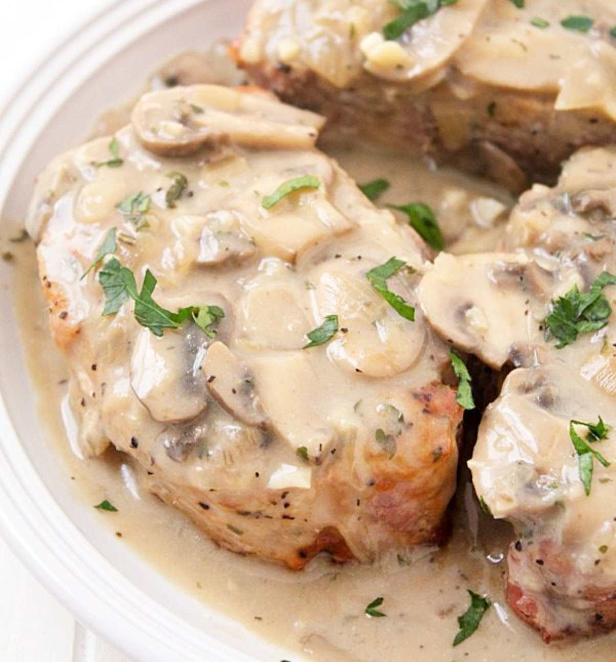 Juicy pork chops and fresh button mushrooms come together to create a - photo 3