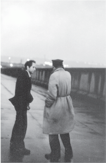 Robert Frank and musician Larry Rivers on a windswept causeway New York 1959 - photo 2