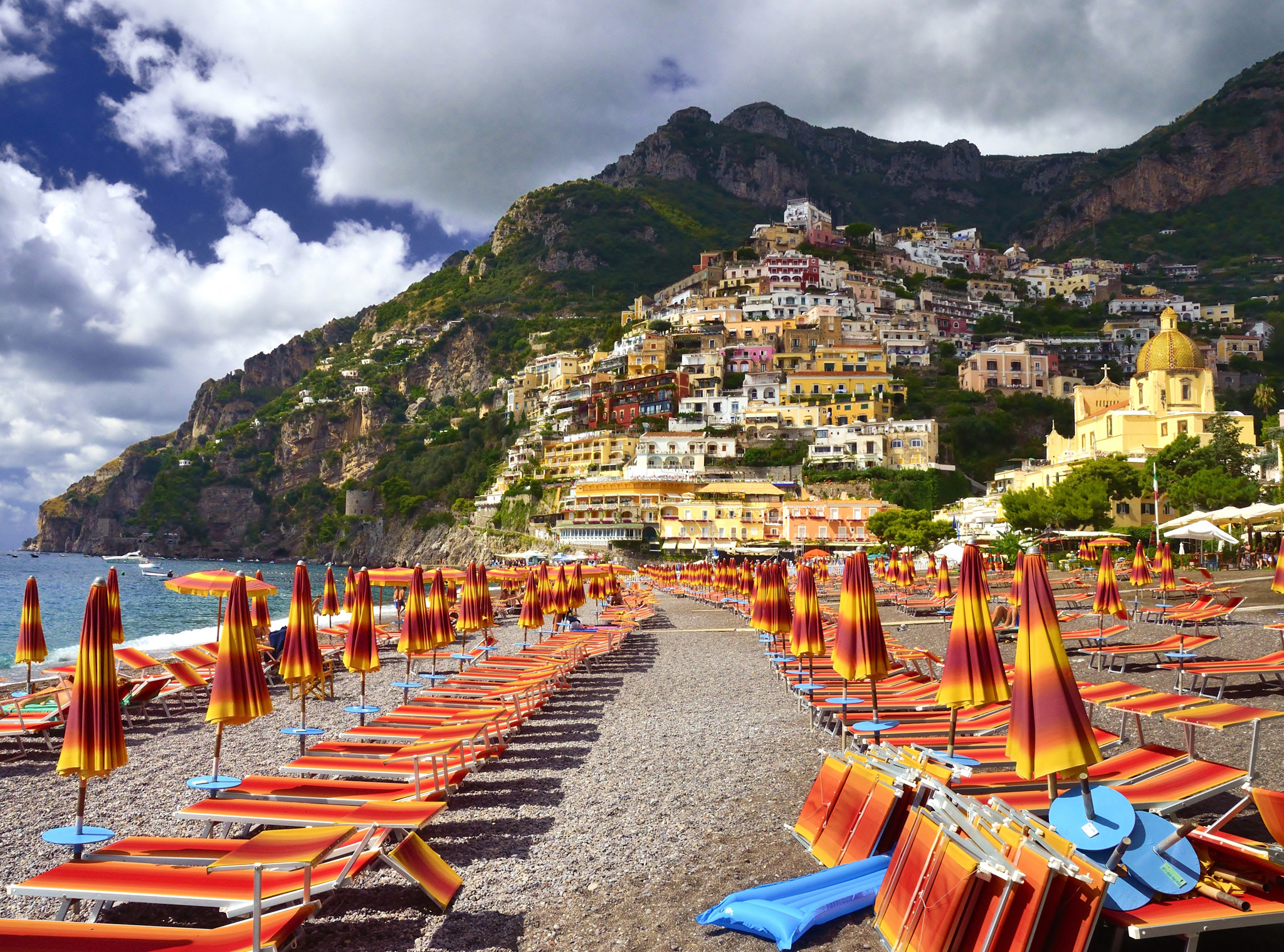 Clinging to the hillside Positano is a stunning backdrop to the sandy beach - photo 5