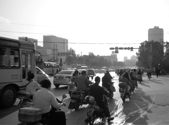 The army of eBikes in Kunming Kunming street All photos were taken by - photo 6