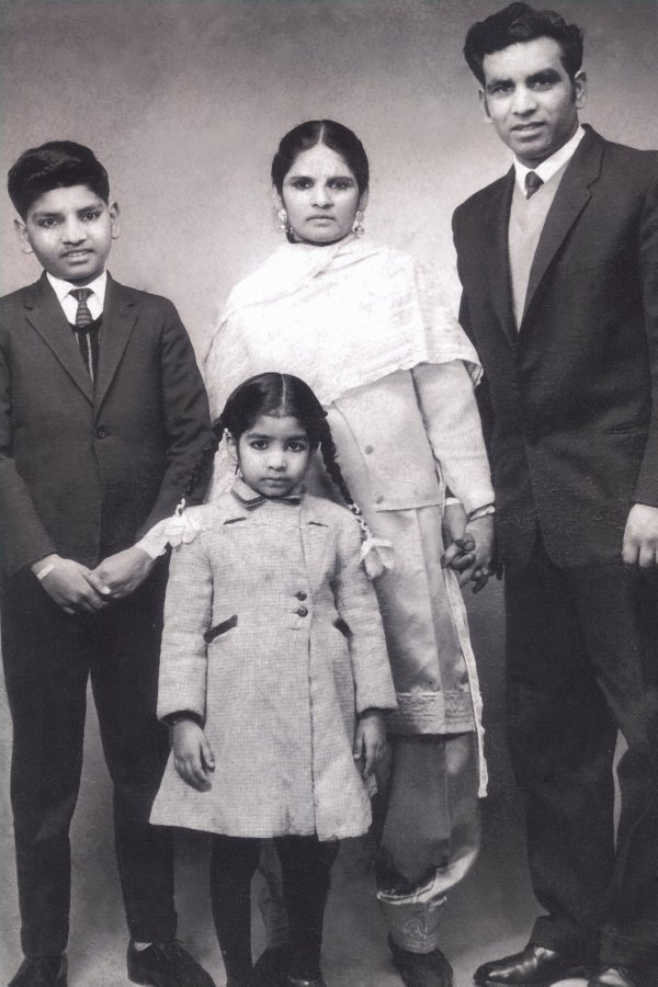 My dad as a child with my granny grandad and my aunty Desi a definition - photo 16