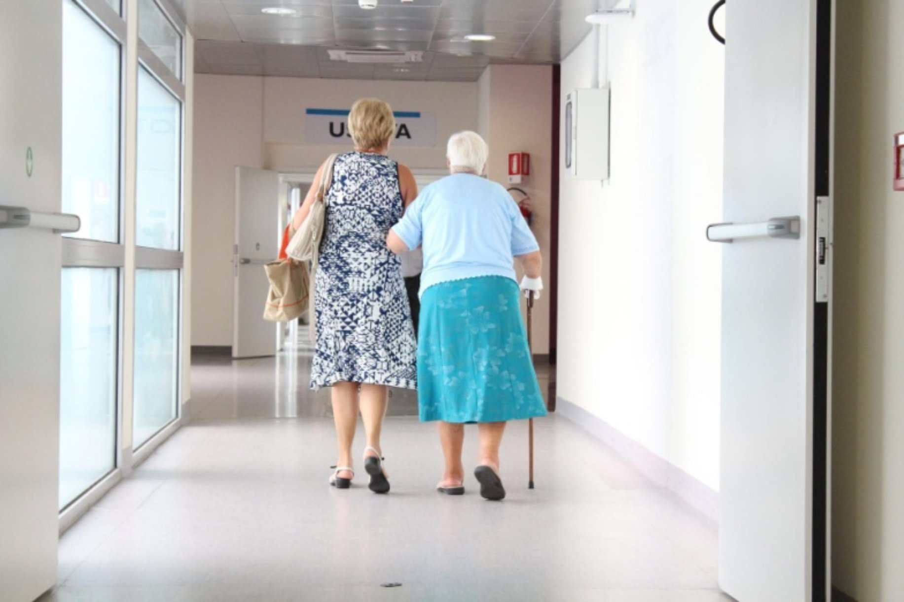 1 An elderly lady supported by a younger woman and a cane - photo 2