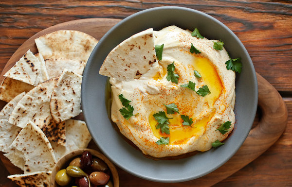 The great secret to a beautiful Israeli-based hummus is a large amount of - photo 4