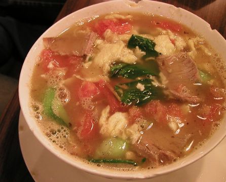 The egg and tomato noodle soup that is native to Beijing is an authentic - photo 9