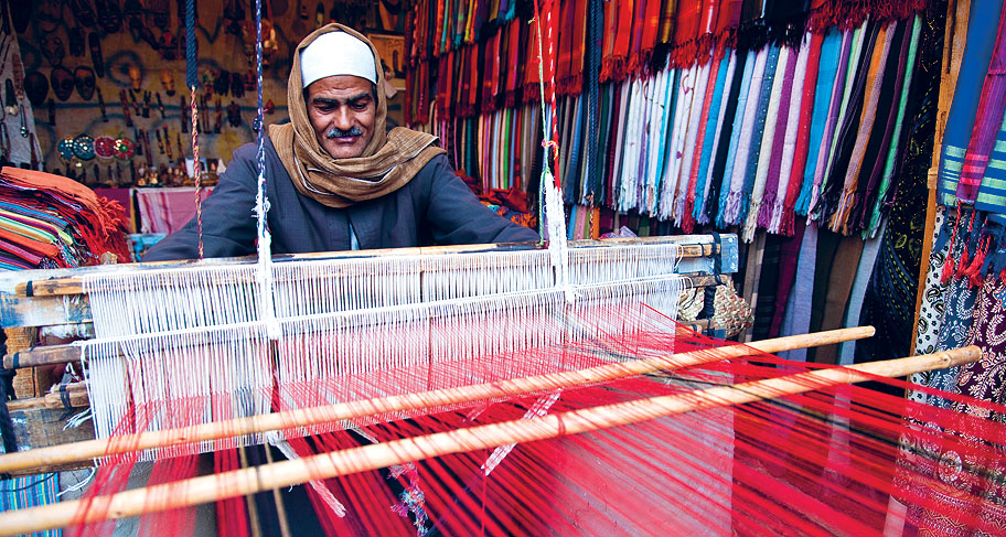 Loom weaver Aswan RICHARD IANSON LONELY PLANET IMAGES Pyramids More - photo 5