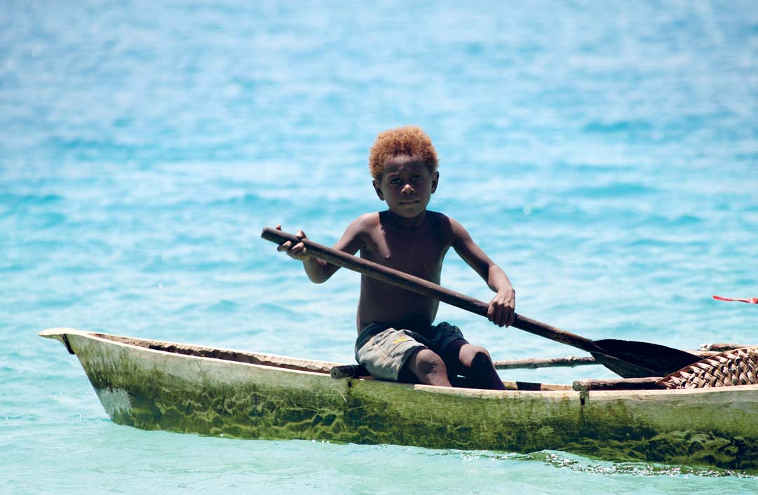 An Ulu Island boy enjoying azure waters in East New Britain JOHN - photo 4