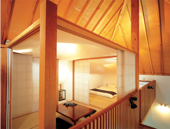 Perched over the main living area under the exposed rafters of the ceiling - photo 4