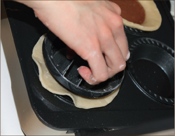 When using a mini pie maker appliance press the dough down carefully to make - photo 8