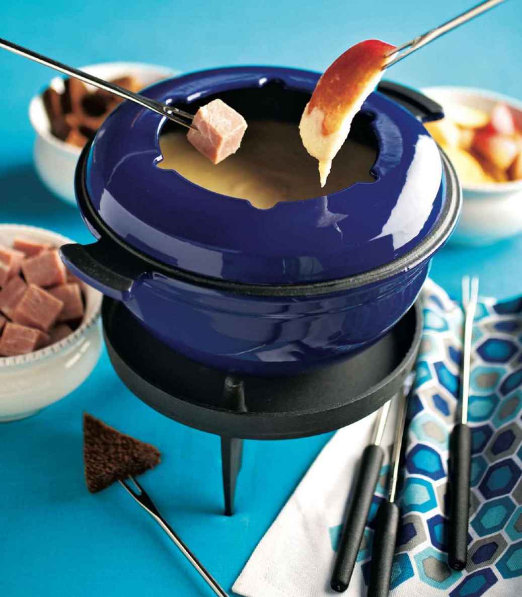 FONDUE BASICS After almost three decades fondue is back at the top of the - photo 3