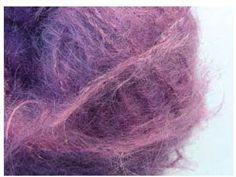 Mohair yarn is characterized by long fibers that create a halo effect around a - photo 15