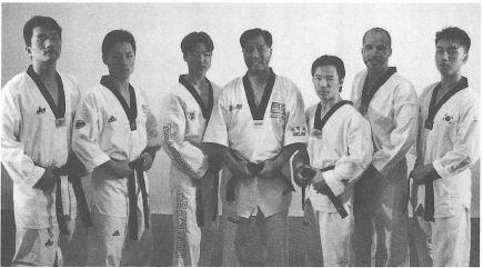 Grandmaster Park center and Mr Gerrard second from right with the YH - photo 2