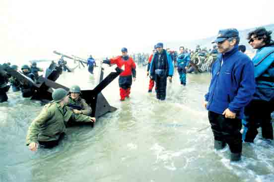 Above Steven Spielberg far right directing the Omaha Beach D-day sequence in - photo 14