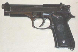 Figure 1-1 9-mm pistol M9 Figure 1-2 9-mm pistol M11 1-1 Description - photo 2