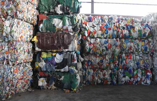 Bales of sorted recyclable plastics at the Houston Material Recovery Facility - photo 10