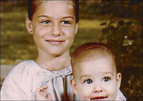 Me around age nine holding my baby brother Adam almost one He is still the - photo 5