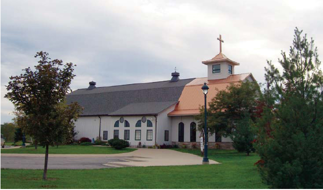 A close look reveals a gambrel-roofed barn in church attire home to the Pious - photo 12