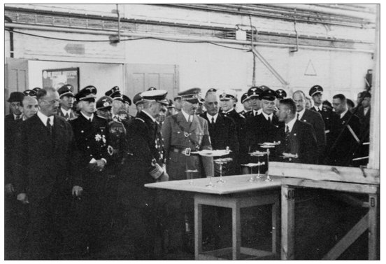 Adolf Hitler being briefed about new aircraft projects by Dr-Ing Vogt during - photo 2