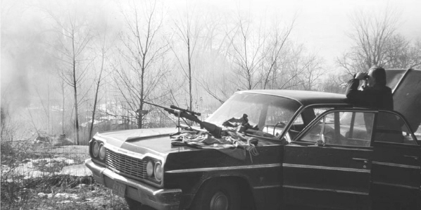 Author and buddy glassing across a Minnesota swamp in the Spring of 1972 for - photo 7