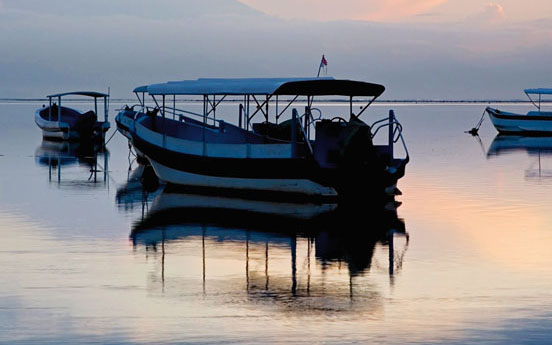 Ferries moored at Sanur DENNIS WALTONLONELY PLANET IMAGES Bali is like no - photo 4