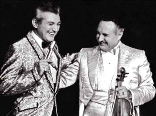 Liberace and his brother George Liberace Liberaces ensembles created by - photo 7