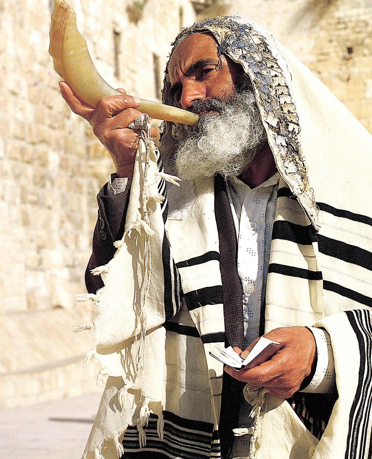 An Orthodox Jew with a shofar rams horn at the Western Wall Richard - photo 3