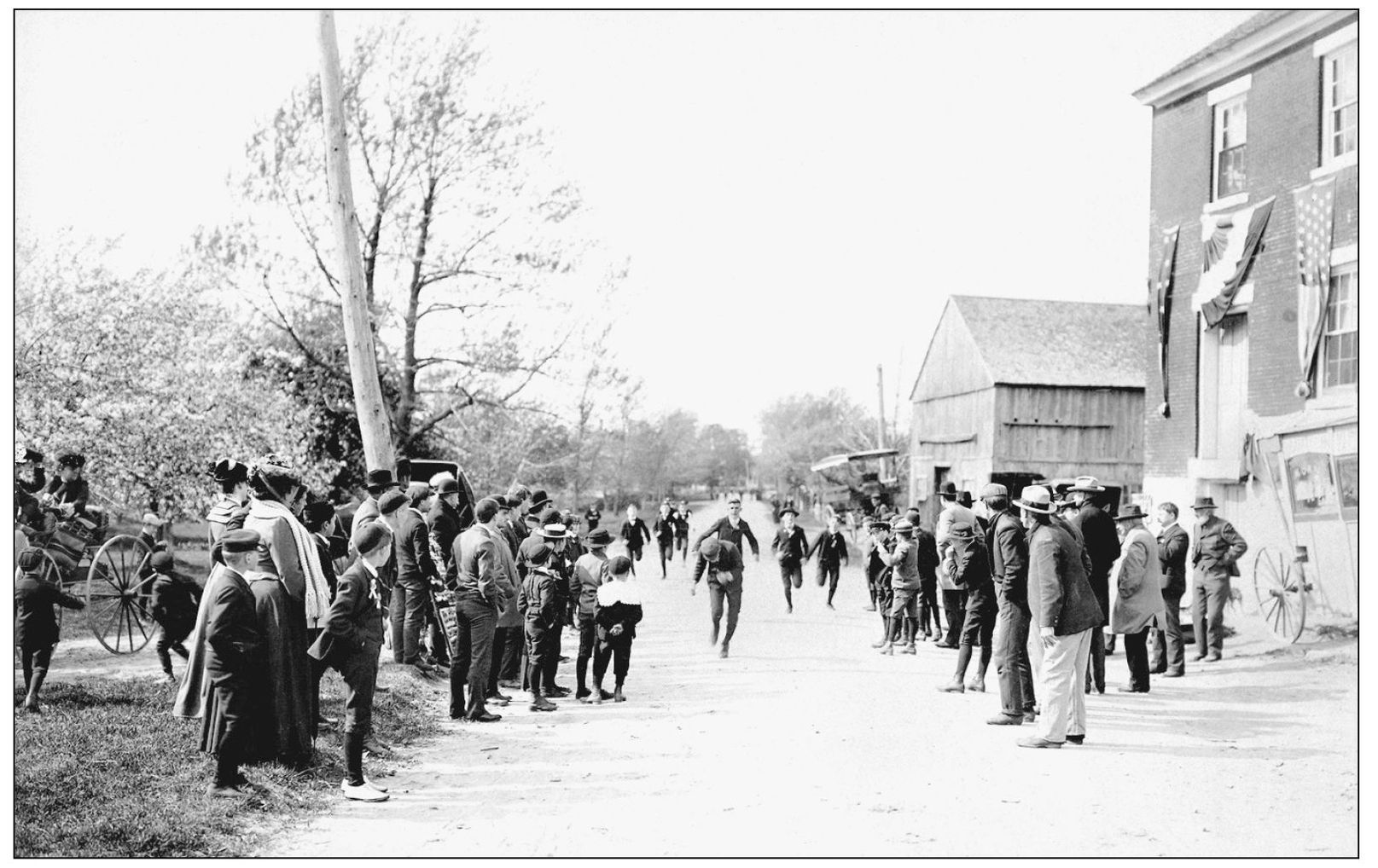 Children run a footrace down Singletary Avenue on May 16 1904 the second day - photo 4