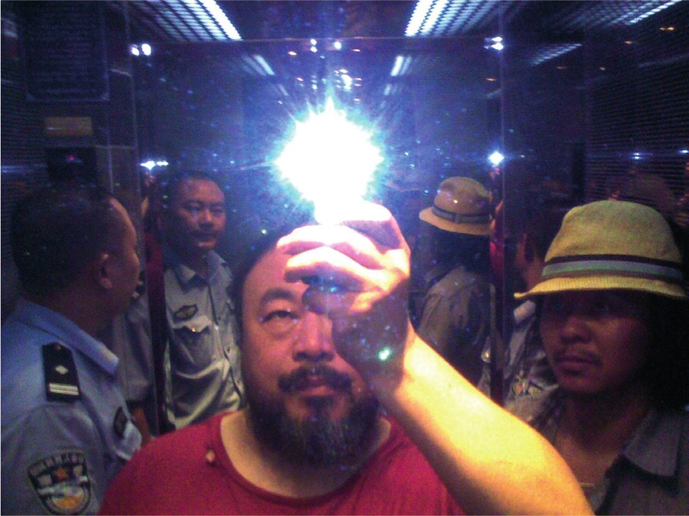 4 Ai Weiwei with rock star Zuoxiao Zuzhou in the elevator when taken into - photo 5