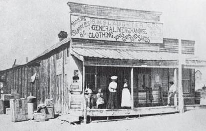 S N Slaughter General Merchandise store with women standing on the raised - photo 6