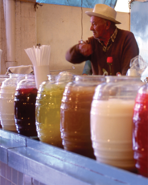 Small glass barrels of aguas frescas are a common sight throughout Mexico This - photo 9