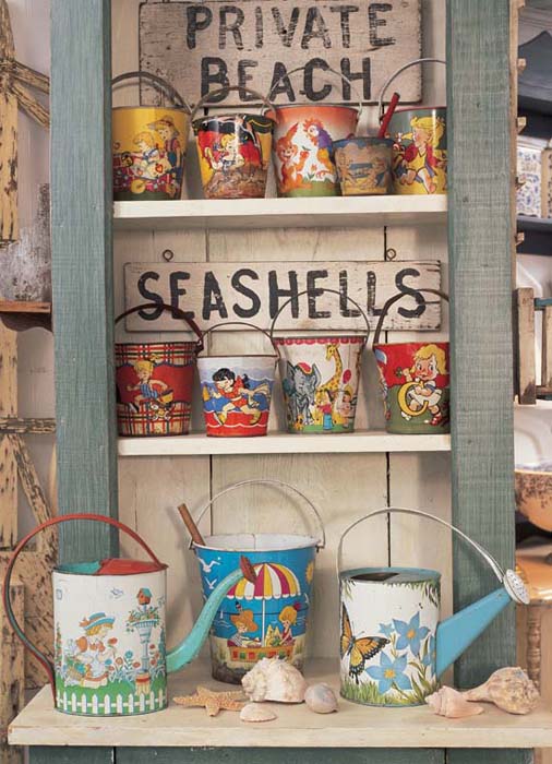 Shelves filled with colorful sand pails and hand-painted signs offer the - photo 3