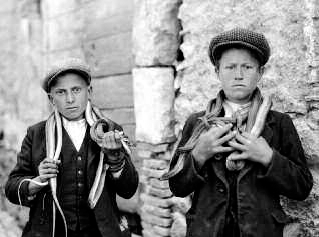 Two serpari snake-charmers celebrate San Domenicos Day in Cocullo Italy - photo 6